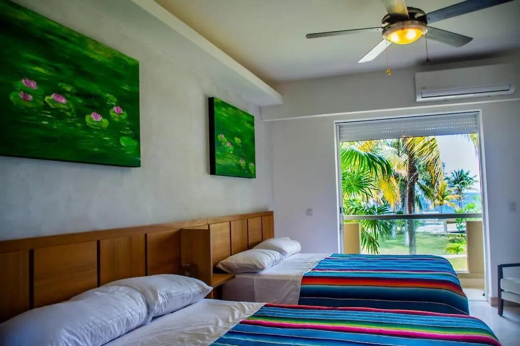 El Descanso Del Navegante Frente Al Mar Puerto Morelos